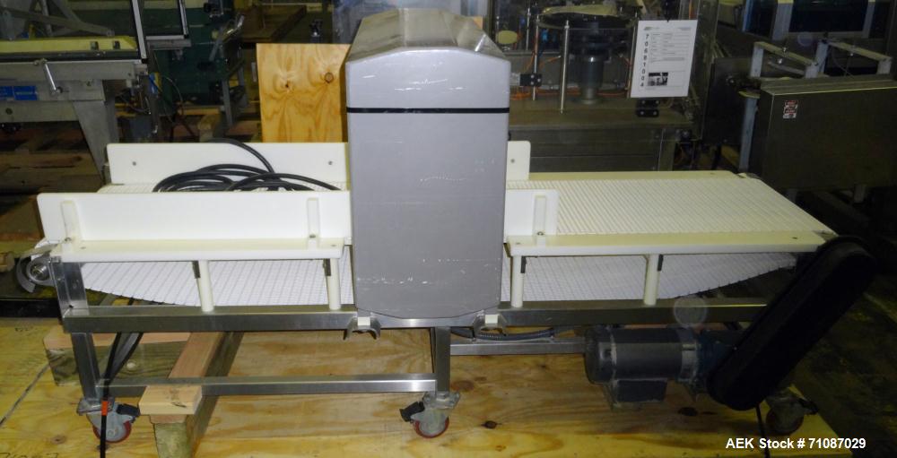 Used Safeline (Mettler-Toledo) Model PowerPhase Plus Metal Detector.  Aperature  20" Wide x 16" Tall, with 14.5" useable Height, with 18" Wide x 84" Long conveyor. Unit has conveyor stop when detecti...