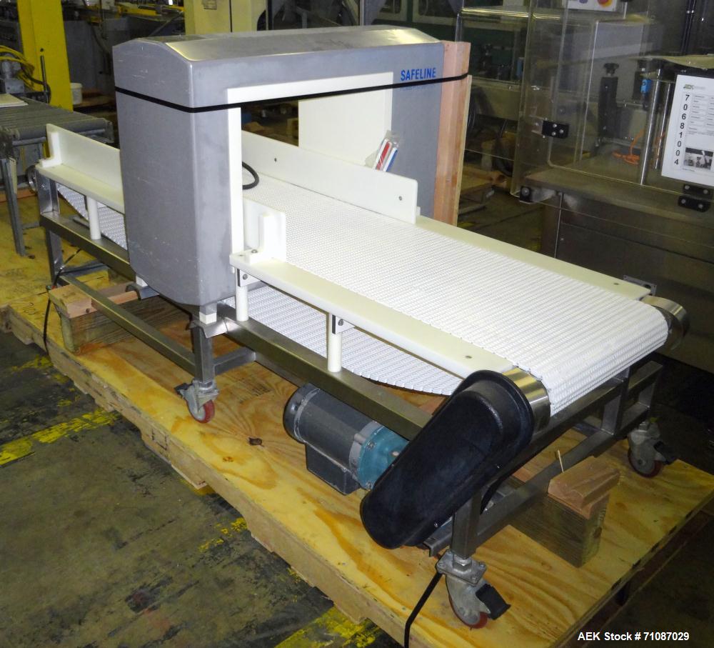 Used Safeline (Mettler-Toledo) Model PowerPhase Plus Metal Detector.  Aperature  20" Wide x 16" Tall, with 14.5" useable Height, with 18" Wide x 84" Long conveyor. Unit has conveyor stop when detecti...
