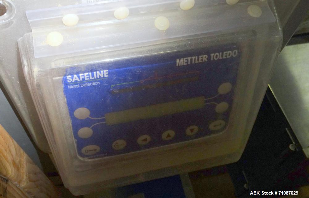 Used Safeline (Mettler-Toledo) Model PowerPhase Plus Metal Detector.  Aperature  20" Wide x 16" Tall, with 14.5" useable Height, with 18" Wide x 84" Long conveyor. Unit has conveyor stop when detecti...
