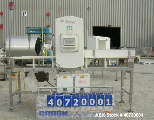 Used Safeline Metal Detector, Model STD18X19-P-300-MD. Aperture size 18" wide x 19" high x 16" long. Includes a control panel and a belt conveyor, 16" wide x 84" long plastic belt, driven by a 1/3 hp...