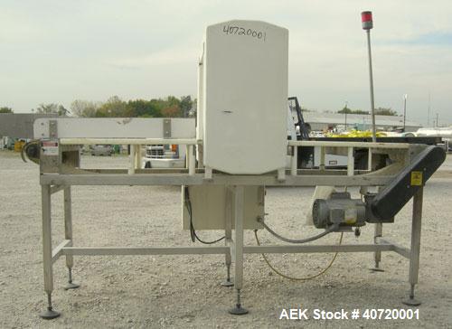 Used Safeline Metal Detector, Model STD18X19-P-300-MD. Aperture size 18" wide x 19" high x 16" long. Includes a control panel and a belt conveyor, 16" wide x 84" long plastic belt, driven by a 1/3 hp...