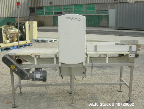Used Safeline Metal Detector, Model STD18X19-P-300-MD. Aperture size 18" wide x 19" high x 16" long. Includes a control panel and a belt conveyor, 16" wide x 84" long plastic belt, driven by a 1/2 hp...