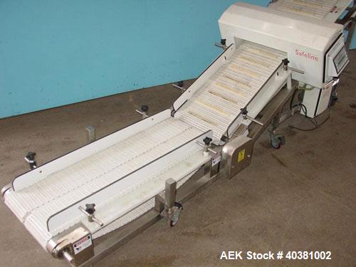 Used Safeline Metal Detector, model STD18X5PILV2. 18" x 5" aperature. Detector HeadRef # 110073, M/C# 333, Ref Phase 2638, PWD DR# 165, OOBV 10MV, Firmware Version 2.23. Includes a plastic mesh incli...
