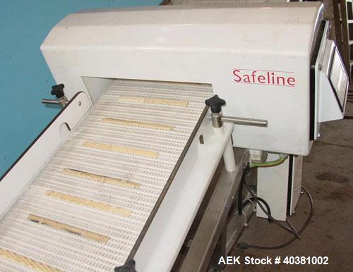 Used Safeline Metal Detector, model STD18X5PILV2. 18" x 5" aperature. Detector HeadRef # 110073, M/C# 333, Ref Phase 2638, PWD DR# 165, OOBV 10MV, Firmware Version 2.23. Includes a plastic mesh incli...