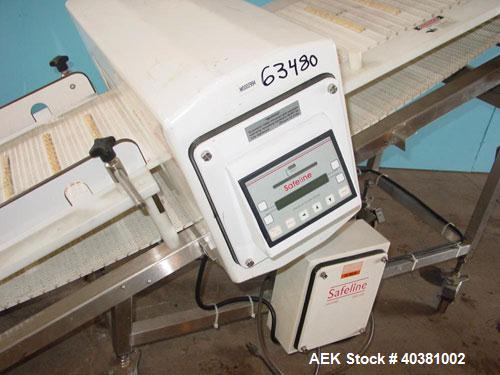 Used Safeline Metal Detector, model STD18X5PILV2. 18" x 5" aperature. Detector HeadRef # 110073, M/C# 333, Ref Phase 2638, PWD DR# 165, OOBV 10MV, Firmware Version 2.23. Includes a plastic mesh incli...
