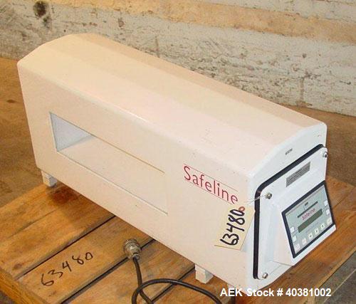 Used Safeline Metal Detector, model STD18X5PILV2. 18" x 5" aperature. Detector HeadRef # 110073, M/C# 333, Ref Phase 2638, PWD DR# 165, OOBV 10MV, Firmware Version 2.23. Includes a plastic mesh incli...