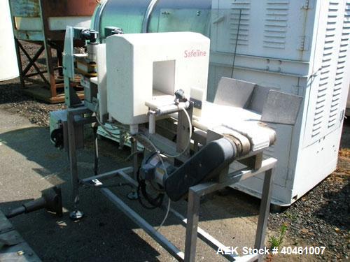 Used Safeline Metal Detector, model ZPMF2 6X9. Aperture size 6" wide x 9" high. Belt conveyor 4" wide x 5' long with 2 side gripper belts with drives. Approximately 7 3/4" clearance from top of belt ...