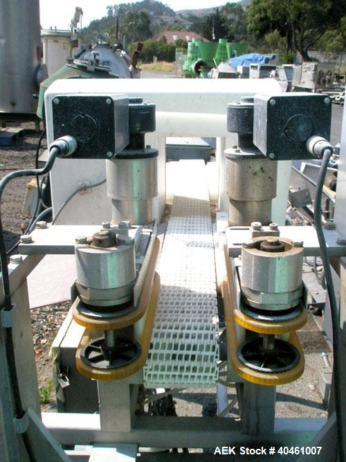 Used Safeline Metal Detector, model ZPMF2 6X9. Aperture size 6" wide x 9" high. Belt conveyor 4" wide x 5' long with 2 side gripper belts with drives. Approximately 7 3/4" clearance from top of belt ...