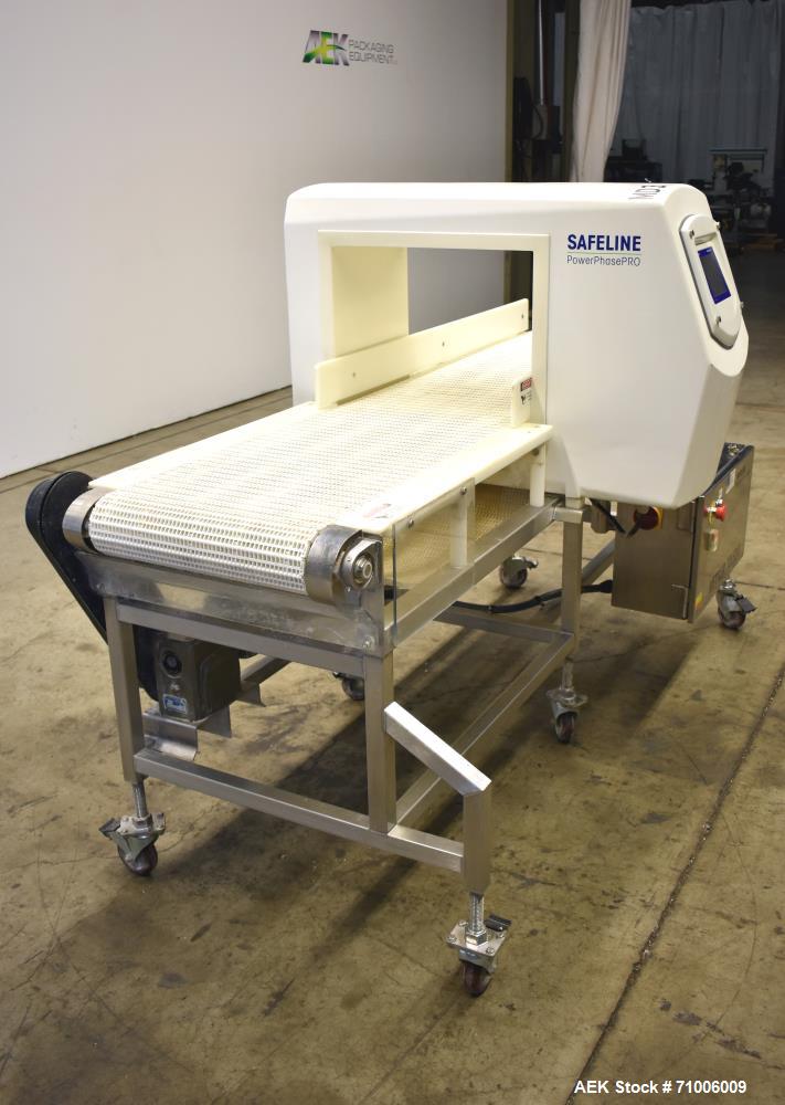 Used Safeline-Power Phase PRO Metal Detector. Model SL2000, 18.75" Wide x 14.75" tall aperture, 18" wide x 83" long plastic mattop conveyor. Stop belt reject. Stainless steel frame on casters. 1/60/1...
