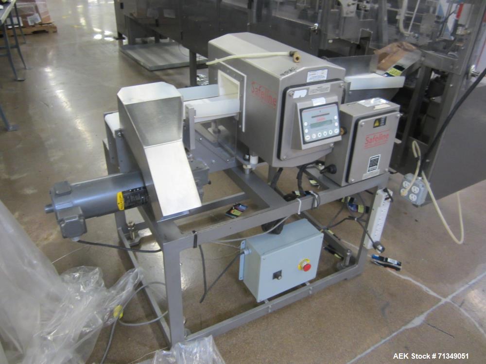 Used Safeline Powerphase Metal Detector. Aperture measures 3-1/2" tall x 5-3/4" wide. Belt conveyor measures 5 "W x 53"L. Includes pneumatic reject. Serial# 61605