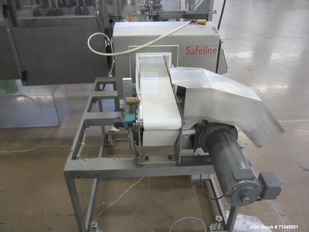 Used Safeline Powerphase Metal Detector. Aperture measures 3-1/2" tall x 5-3/4" wide. Belt conveyor measures 5 "W x 53"L. Includes pneumatic reject. Serial# 61605