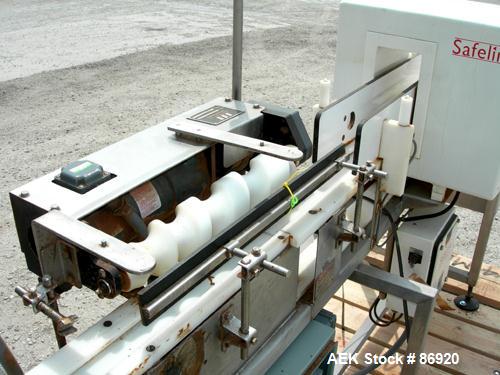 Used Safeline Metal Detector. Aperture size 5" wide x 9-7/8" high x 11-3/8" long. Requires belt and motor for conveyor, includes a Morrison timing screw conveyor, model B01118555-001, driven by a DC ...