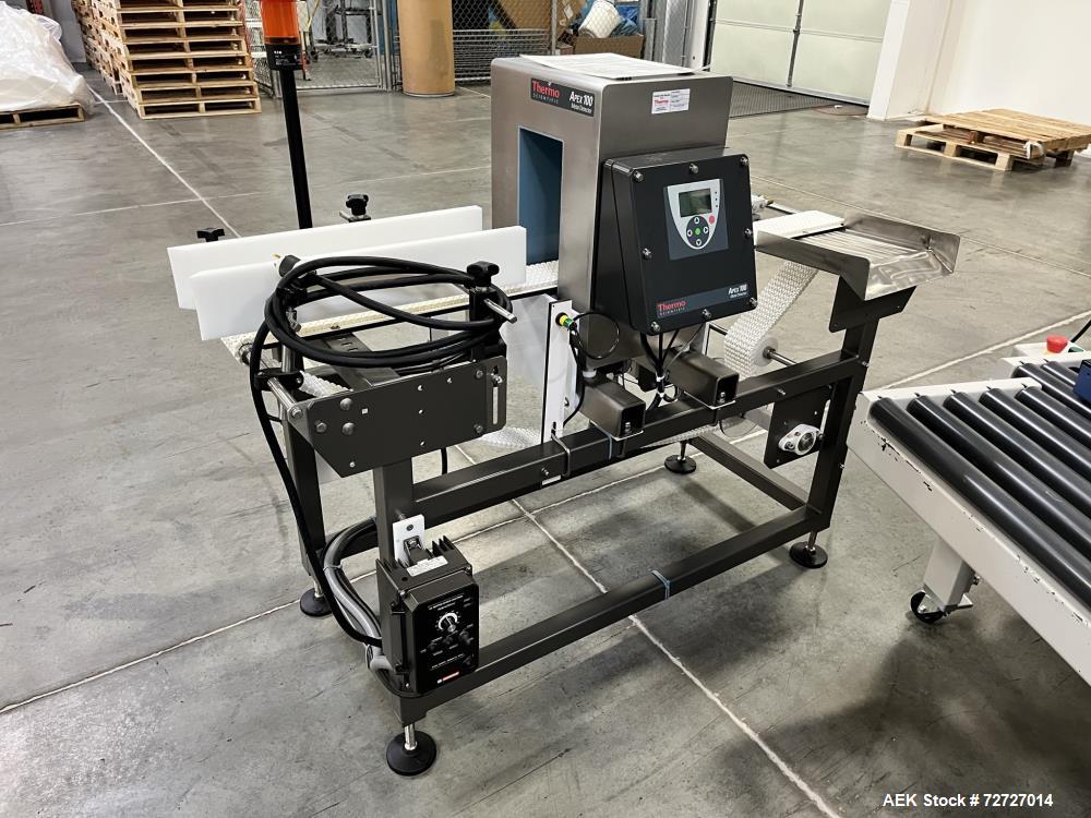 Used Thermo Scientific Conveyor Mounted Metal Detector, Model Apex 100. 304 Stainless Steel. Aperture size: 5 3/4 " wide x 10" tall from the conveyor belt that product can pass through. Reject is air...