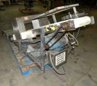 Used Lock Metalchek Metal Detector, Model 30CKE. Aperture size 14