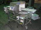 Used Lock Model Met 30+ Universal 3F Metal Detector. Machine has conveyor attached. Has a 13