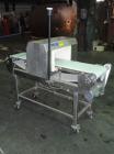 Used Lock Model Met 30+ Universal 3F Metal Detector. Machine has conveyor attached. Has a 13