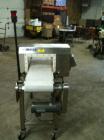 Used Lock Model Met 30+ Universal 3F Metal Detector. Machine has conveyor attached. Has a 13