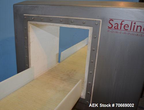 Used Safeline Powerphase Metal Detector Conveyorized Metal Detector, 13 3/4 in W x 13 1/2 in H Aperture, 68 in L x 12 in W x 40 in H Plastic Mesh Belt Conveyor, Buzzer and Conveyor Stop Style Reject,...