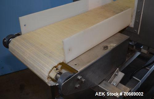 Used Safeline Powerphase Metal Detector Conveyorized Metal Detector, 13 3/4 in W x 13 1/2 in H Aperture, 68 in L x 12 in W x 40 in H Plastic Mesh Belt Conveyor, Buzzer and Conveyor Stop Style Reject,...