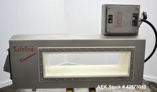 Used Safeline Signature 2 Pass Through Metal Detector, 304 Stainless Steel. Aperture size approximately 25-1/2" wide x 7" high x 11" long. Sensitivity Ratio300 / 800 kHz, Non-Ferrous x 1.1 to 1.3 Fe....