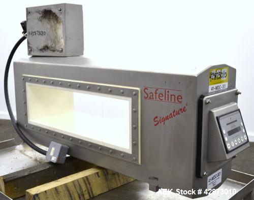 Used Safeline Signature 2 Pass Through Metal Detector, 304 Stainless Steel. Aperture size approximately 25-1/2" wide x 7" high x 11" long. Sensitivity Ratio300 / 800 kHz, Non-Ferrous x 1.1 to 1.3 Fe....