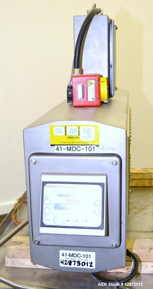 Used Safeline Signature 2 Pass Through Metal Detector, 304 Stainless Steel. Aperture size approximately 25-1/2" wide x 7" high x 11" long. Sensitivity Ratio dependent of coil system at 300 kHz, Non-F...