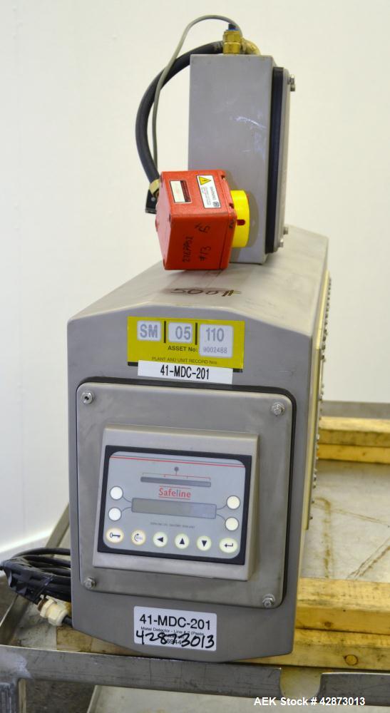 Used Safeline Signature Pass Through Metal Detector, 304 Stainless Steel. Aperture size approximately 25-1/2" wide x 7" high x 11" long. Sensitivity Ratio dependent of coil system at 300 kHz, Non-Fer...