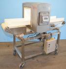 Used Safeline Powerphase Metal Detector Conveyorized Metal Detector, 13 3/4 in W x 13 1/2 in H Aperture, 68 in L x 12 in W x 40 in H Plastic Mesh Belt Conveyor, Buzzer and Conveyor Stop Style Reject,...