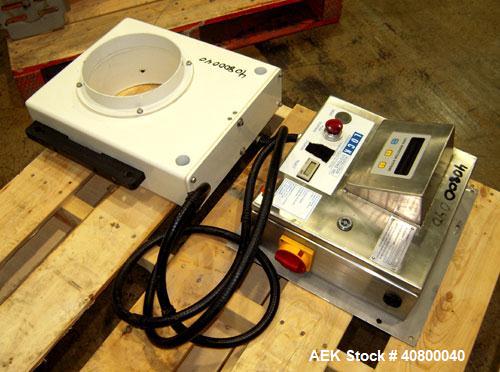 Used Lock Inspection Systems Metal Detector. Aperature size approximately 8 5/8" diameter x 4" deep. Includes a control panel.