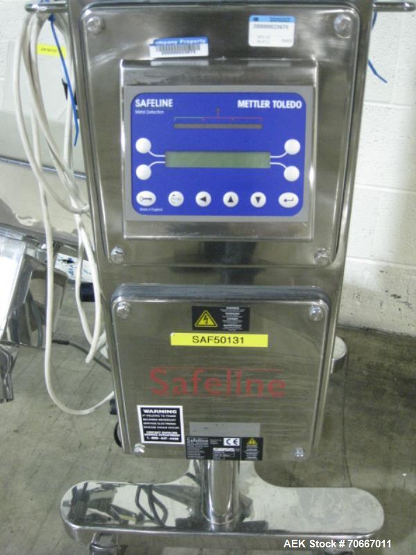 Used Safline metal detector, 3.75" x 1.5" aperature, with diverter, on stainless steel stand, serial # 50131.  NOTE: PRICE INCLUDES A 15% BUYERS PREMIUM.