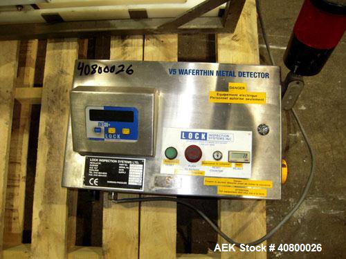 Used Lock Inspection Systems V5 Waferthin Met 30+ Metal Detector, Model Met30-200/+/IP54/286KHZ. Aperture size approximately 8 5/8" diameter x 4" deep. Includes a control panel. Built 2002.
