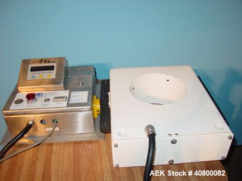 Used Lock Inspection Systems V5 Waferthin Met 30+ Metal Detector, Model Met30-200/+/IP54/286KHZ. Aperture size approximately 8 5/8" diameter x 4" deep. Includes a control panel. Built 2002.