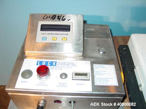 Used Lock Inspection Systems V5 Waferthin Met 30+ Metal Detector, Model Met30-200/+/IP54/286KHZ. Aperture size approximately 8 5/8" diameter x 4" deep. Includes a control panel. Built 2002.