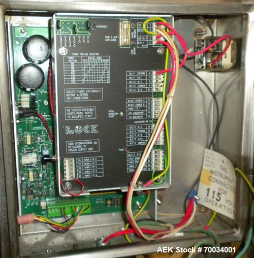 Used Yamato Lock Inspection Systems Fall Thru Metal Detector, Model Metalchek 10. Approximate 8" diameter x 4" deep chamber. Detects metals up to .75 mm (.029’’) ferrous, non-ferrous and stainless st...