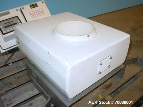 Used Safeline Inline Flow Through Metal Detector, 7" diameter x 8-1/2" deep apurture. Hardware version 82/rem, firmware version 1.251, remote mounted control head, stainless steel mounting bracket. M...