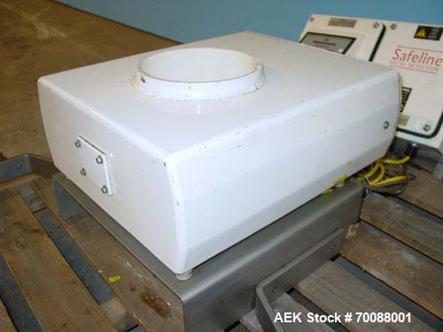 Used Safeline Inline Flow Through Metal Detector, 7" diameter x 8-1/2" deep apurture. Hardware version 82/rem, firmware version 1.251, remote mounted control head, stainless steel mounting bracket. M...