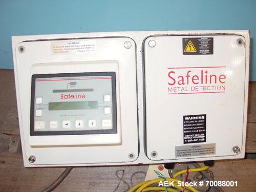 Used Safeline Inline Flow Through Metal Detector, 7" diameter x 8-1/2" deep apurture. Hardware version 82/rem, firmware version 1.251, remote mounted control head, stainless steel mounting bracket. M...