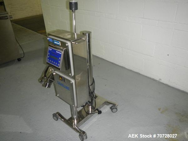 Used Safeline pass thru tablet metal detector, model 2S, 1.25" x 3" opening, on stand with reject, serial# 893401, new 2007.