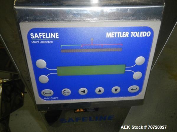 Used Safeline pass thru tablet metal detector, model 2S, 1.25" x 3" opening, on stand with reject, serial# 893401, new 2007.
