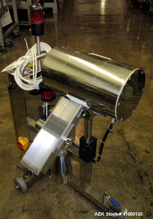 Used Lock Inspection Systems Fall Thru Metal Detector, Model MET 30+ Universal. 3 3/4" wide x 1-3/4" high opening with reject, 115 volt with controls on stand. Capable of 30,000 tablets/capsules per ...