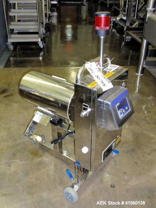 Used Lock Metal Detector, fall thru design, model MET 30+ Universal, serial #5774/1. 3-3/4" wide x 1-3/4" high opening with reject, 115 volt with controls on stand. Capable of 30000 tablets/capsules ...