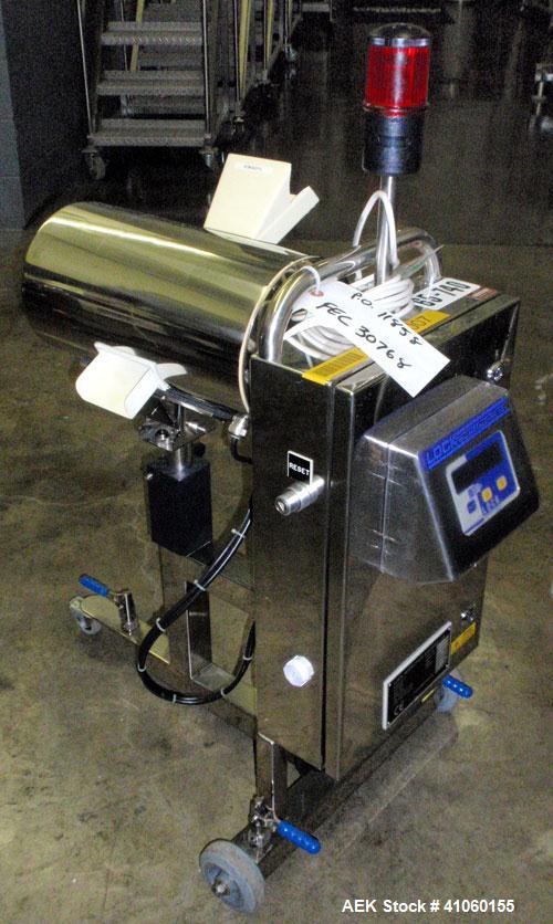 Used Lock Inspection Systems Fall Thru Metal Detector, Model MET 30+ Universal. 3 3/4" wide x 1-3/4" high opening with reject, 115 volt with controls on stand. Capable of 30,000 tablets/capsules per ...