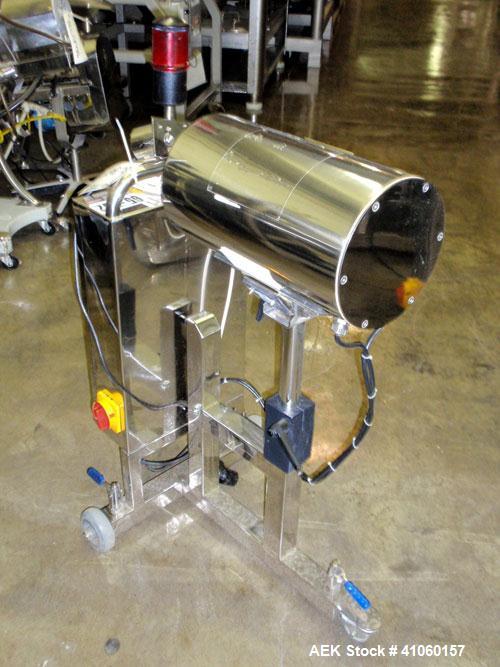 Used Lock Inspection Systems Fall Thru Metal Detector, Model MET 30+ Universal. 3 3/4" wide x 1-3/4" high opening with reject, 115 volt with controls on stand. Capable of 30,000 tablets/capsules per ...