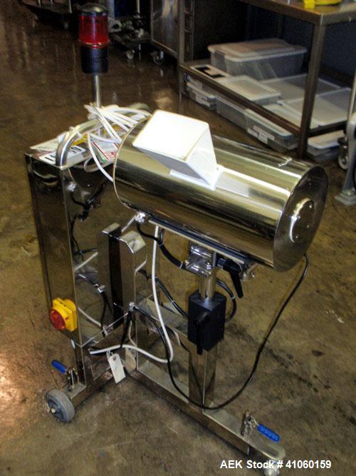 Used Lock Inspection Systems Fall Thru Metal Detector, Model MET 30+ Universal. 3 3/4" wide x 1-3/4" high opening with reject, 115 volt with controls on stand. Capable of 30,000 tablets/capsules per ...
