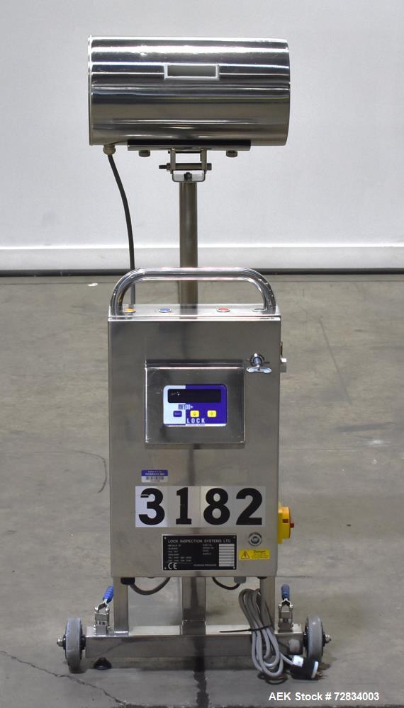 Used- Lock Inspection Systems LTD Metal Detector, Model MET 30+. Aperature approximately 3.75" wide x 1" tall opening. Mount...