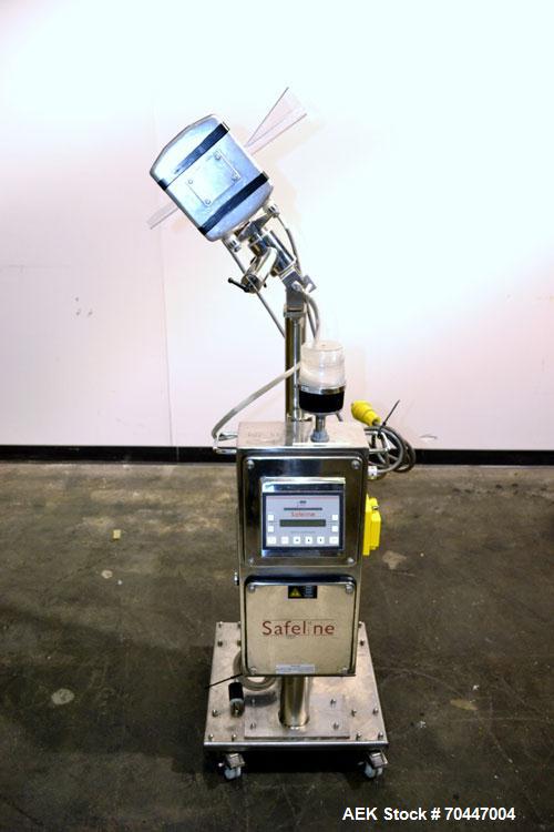Used Safeline PharmXS Tablet/Capsule Metal Detector, Model PHARMXS/76X38/V2/600/RC, Stainless Steel. Approximate aperture 1.3’’ tall x 3.7’’ wide. Rated up to 10,000 tablets per minute. Mounted on a ...