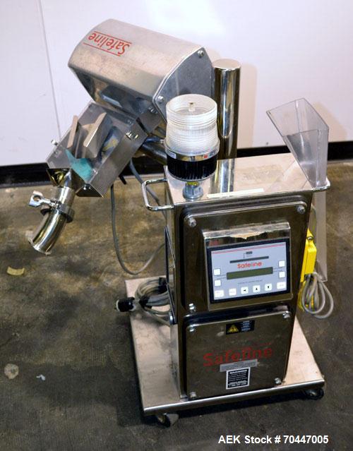 Used Safeline PharmX Tablet/Capsule Metal Detector, Model PHARMXS/76X38/V2/600/RC, Stainless Steel. Approximate aperture 1.3’’ tall x 3.7’’ wide. Rated up to 10,000 tablets per minute. Mounted on a s...