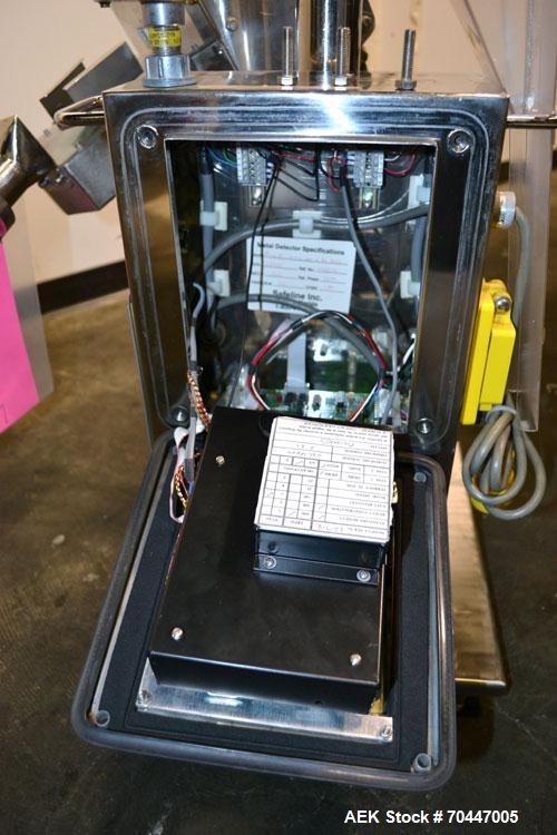Used Safeline PharmX Tablet/Capsule Metal Detector, Model PHARMXS/76X38/V2/600/RC, Stainless Steel. Approximate aperture 1.3’’ tall x 3.7’’ wide. Rated up to 10,000 tablets per minute. Mounted on a s...