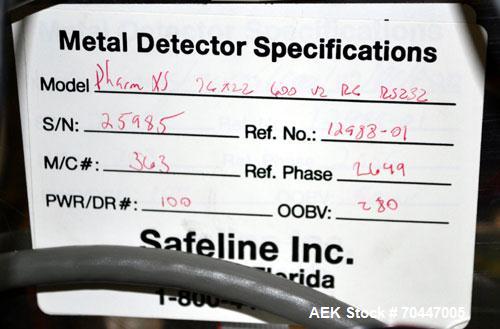 Used Safeline PharmX Tablet/Capsule Metal Detector, Model PHARMXS/76X38/V2/600/RC, Stainless Steel. Approximate aperture 1.3’’ tall x 3.7’’ wide. Rated up to 10,000 tablets per minute. Mounted on a s...