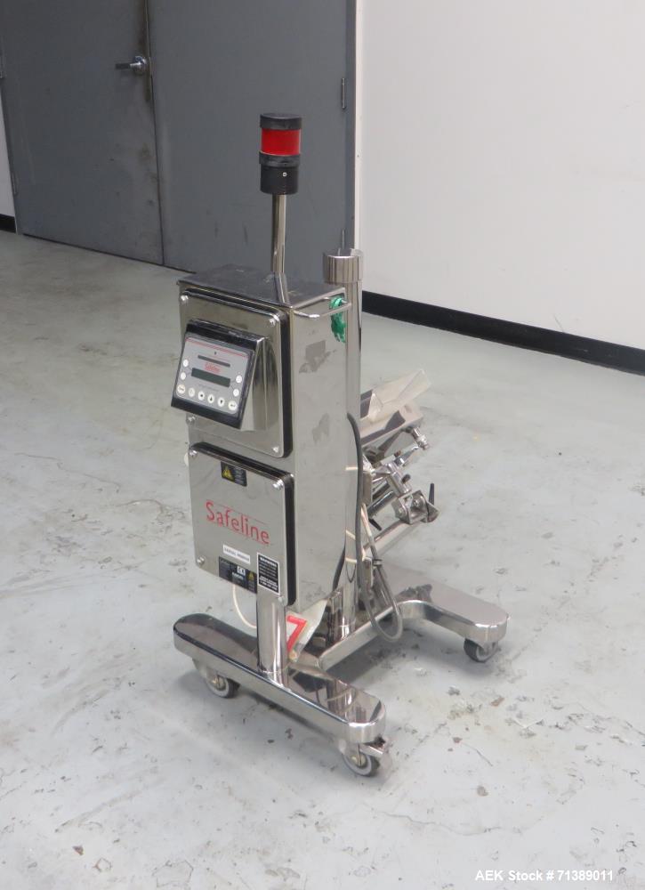 Used Safeline Capsule Metal Detector.
